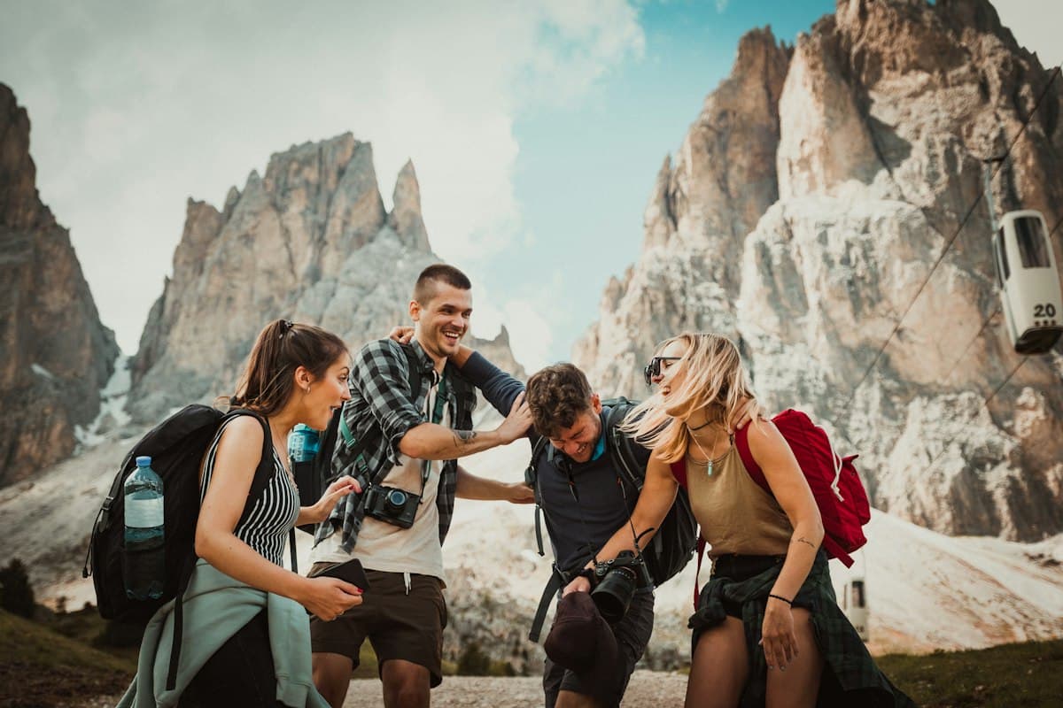 Friends hiking together in the mountains