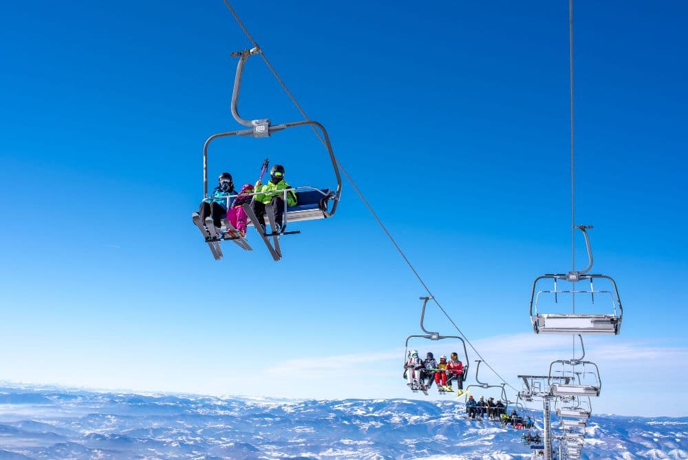 Plan a trip to Gulmarg for gondola rides, snow sports, and winter views of Kashmir